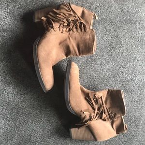 Tan rampage booties with fringe. Worn a few times. Very comfy and cute!